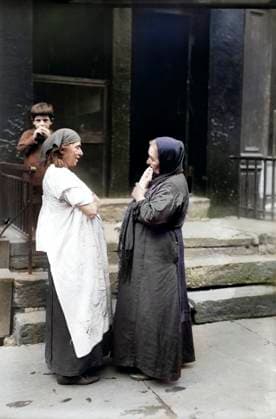 Two Syrian women talking in front of residential building, New York City, New York, USA, Bain News Service, 1916  Copyright: xCircaxImagesx ghi-circa12636