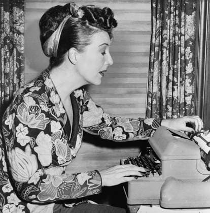 Gypsy Rose Lee, portrait, seated at typewriter, Fred Palumbo, New York World-Telegram & Sun Collection, 1956  Copyright: xCircaxImagesx ghi-circa12714