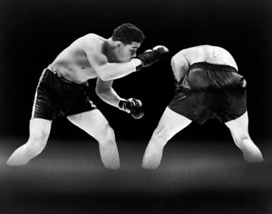 American boxer Joe Louis looking for opening during boxing match with German boxer Max Schmeling, Yankee Stadium, Bronx, New York City, New York, USA, New York World-Telegram and the Sun Newspaper Photograph Collection, June 19,1936  Copyright: xCircaxImagesx ghi-circa12787