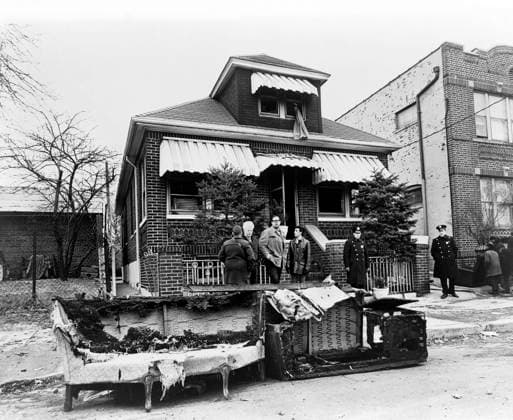 Exterior view of the home of Malcolm X after it was firebombed, remains of charred furniture in foreground, 23-11 97th Street, East Elmhurst, Queens, New York City, New York, USA, Stanley Wolfson, New York World-Telegram and the Sun Newspaper Photograph Collection, February 14, 1965  Copyright: xCircaxImagesx ghi-circa12788