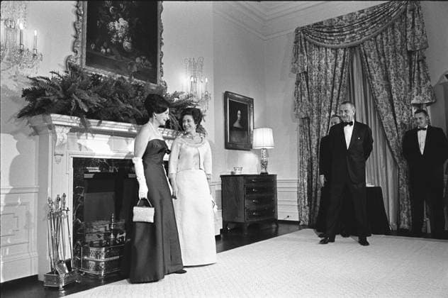 November 17, 1965, Washington, District Of Columbia, USA: Lady Bird Johnson and Princess Margaret of Great Britain pose in front of fireplace, U.S. President Lyndon Johnson and Antony Armstrong Jones (partially obscured behind Johnson) looking on, Queen s Room, White House, Washington, D.C., USA, Yoichi Okamoto, November 17, 1965 Washington USA  - ZUMAg145 19651117_aza_g145_001 Copyright: xJTxVintagex