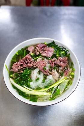Pho Bo, famous Vietnamese soup noodle dish in Vietnam Pho Bo, famous Vietnamese soup noodle dish in street food restaurant in Hanoi, Vietnam Copyright: xZoonar.com DaixNtx 22058735