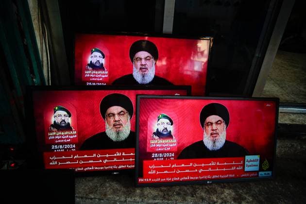 August 25, 2024, Nablus, West Bank, Palestine: TV screens broadcast a speech by Hezbollah Secretary General Sheikh Hassan Nasrallah at a market in the old city of Nablus. Nablus Palestine - ZUMAs197 20240825_aaa_s197_166 Copyright: xNasserxIshtayehx