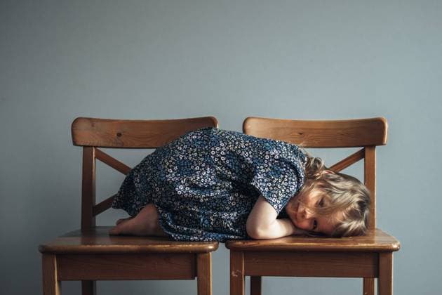 Creative Highlights Symbolbilder Little cute girl lying on the chairs. Saint Petersburg, ?????-?????????, Russia CR_XGWK210914-832419-01 ,model released, Symbolfoto