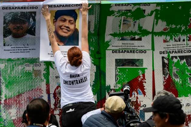August 30, 2024, Mexico City, Mexico City, Mexico: Relatives of the disappeared and activists participate in the placement of photographs during the protests and a mass at the Paseo de la Reforma roundabout, in Mexico City..In Mexico, the Federal Government presented an update of the census of missing persons in which they reduce 20 thousand cases of the 114 thousand 815 reported by the national registry. Mexico City Mexico - ZUMAn296 20240830_zip_n296_010 Copyright: xJorgexNunezx