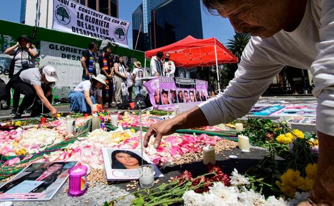August 30, 2024, Mexico City, Mexico City, Mexico: Relatives of the disappeared and activists participate in the placement of photographs during the protests and a mass at the Paseo de la Reforma roundabout, in Mexico City..In Mexico, the Federal Government presented an update of the census of missing persons in which they reduce 20 thousand cases of the 114 thousand 815 reported by the national registry. Mexico City Mexico - ZUMAn296 20240830_zip_n296_018 Copyright: xJorgexNunezx