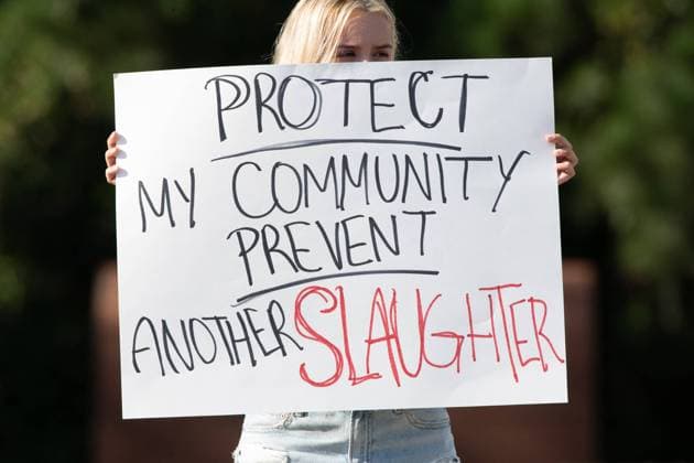 September 4, 2024, Winder, Georgia, USA: GRETCHEN GERLACH holds a sign that reads Protect My Community Prevent Another Slaughter in front of Apalachee High School. Two students and two teachers were killed and nine people were injured in the shooting at Apalachee High School Wednesday, authorities said. Winder USA  - ZUMA 20240904_new_o124_008 Copyright: xChristopherxOquendox