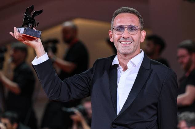 September 7, 2024, Venice: Romanian director Bogdan Muresanu holds the Orizzonti award for Best Film The New Year That Never Came during the closing ceremony of the 81st annual Venice International Film Festival, in Venice, Italy, 07 September 2024. The 81st edition of the festival runs from 28 August to 07 September 2024. ANSA ETTORE FERRARI Venice  - ZUMAa110 20240907_zaf_a110_106 Copyright: xEttorexFerrarix