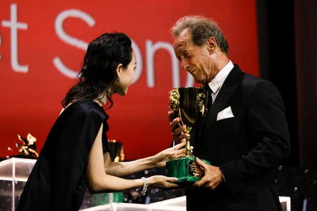 81st Mostra - Closing Ceremony Jury member Zhang Ziyi presents the Volpi Cup for Best Actor Award to Vincent Lindon for The Quiet Son onstage during the 81st Venice International Film Festival at Sala Grande on September 07, 2024 in Venice, Italy. Photo by Marco Piovanotto ABACAPRESS.COM Venice Italy  Copyright: xPiovanottoxMarco ABACAx