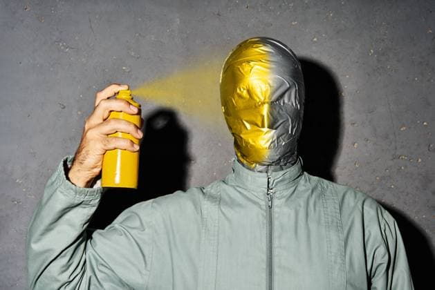 Creative Highlights Symbolfotos Mystery crazy man with duct tape face paints his face with spray paint can over gray background Mystery crazy man with duct tape face paints his face with spray paint can ,model released, Symbolfoto Copyright: xZoonar.com ViktorxGladkovx 22139346 ,model released, Symbolfoto ,property released