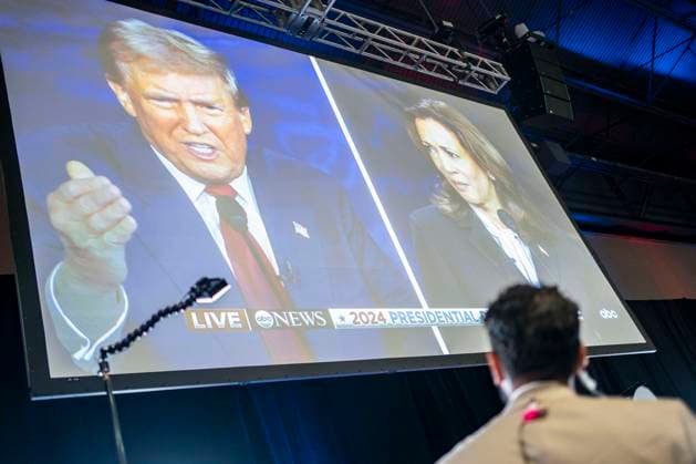 A journalist looks on in the spin room during the ABC Presidential Debate between Democratic presidential nominee and Vice President Kamala Harris and Republican presidential candidate, former U.S. President Donald Trump at the Pennsylvania Convention Center in Philadelphia, Pennsylvania on Tuesday, September 10, 2024. Trump and Harris will meet for their first, and potentially only, debate in a battleground state less than two months before Election Day.  PHI20240910336 BONNIExCASH