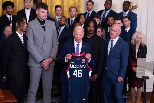 September 10, 2024, Washington, District Of Columbia, USA: United States President Joe Biden receives a team jersey from the University of Connecticut Huskies Men™s Basketball Team at the White House in Washington, DC at an event celebrating their 2023-2024 NCAA championship season, September 10, 2024 Washington USA - ZUMAs152 20240910_faa_s152_119 Copyright: xChrisxKleponisx