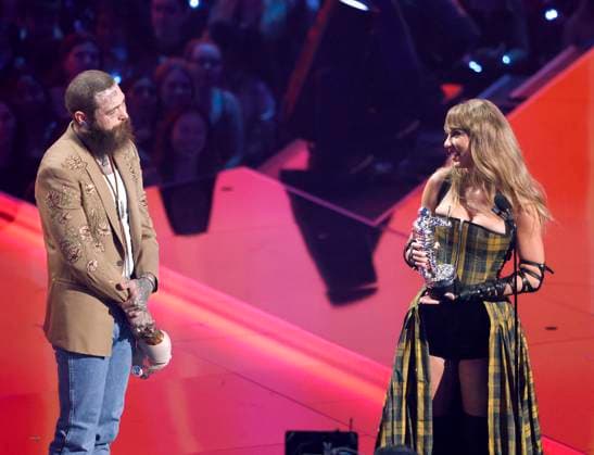 Post Malone and Taylor Swift accept the Best Collaboration award for Fortnight on stage at the 2024 MTV Video Music Awards VMA s at the UBS Arena in Elmont, New York on Wednesday, September 11, 2024.  NYP20240911167 JohnxAngelillo
