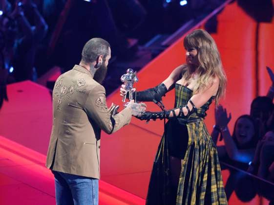 Post Malone and Taylor Swift accept the Best Collaboration award for Fortnight on stage at the 2024 MTV Video Music Awards VMA s at the UBS Arena in Elmont, New York on Wednesday, September 11, 2024.  NYP20240911169 JohnxAngelillo
