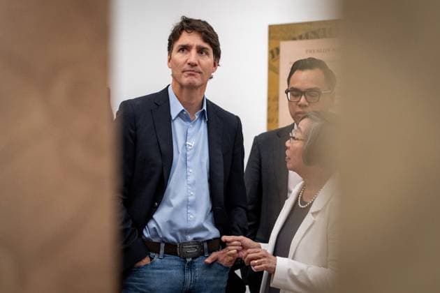 September 12, 2024, Vancouver, Bc, CANADA: Prime Minister Justin Trudeau listens as Chinese Canadian Museum Board Chair, Grace Wong speaks during a tour of the museum in Vancouver, on Thursday, September 12, 2024. Vancouver CANADA  - ZUMAc35_ 20240912_zaf_c35_030 Copyright: xEthanxCairnsx