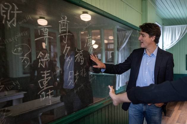 September 12, 2024, Vancouver, Bc, CANADA: Prime Minister Justin Trudeau touches a chalk board in a replica of a classroom during a tour of the Chinese Canadian Museum in Vancouver, on Thursday, September 12, 2024. Vancouver CANADA  - ZUMAc35_ 20240912_zaf_c35_044 Copyright: xEthanxCairnsx