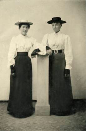 Portrait of Two Adult Women in Hats and Long Dresses Leaning on Pillar, 1870  Copyright: xABxArchivex jtv007806