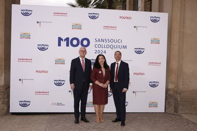 Germany: M100 Media Award in Potsdam Brandenburg: The photo shows the former Defense Minister Rudolf Scharping, the President of the Republic of Kosovo, Dr. Vjosa Osmani-Sadriu and Mike Schubert, Mayor of Potsdam, before the M100 Media Award ceremony in the Orangery Sanssouci in Potsdam Potsdam Brandenburg Germany Copyright: SimonexKuhlmey