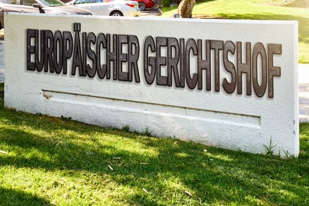 Bavaria, Germany - September 13, 2024: European Court of Justice ECJ, standing on a wall on stone. Concept judgments of the court in Europe. PHOTOMONTAGE *** Europäischer Gerichtshof EuGH, steht auf einer Mauer auf Stein. Konzept Urteile des Gerichts in Europa. FOTOMONTAGE