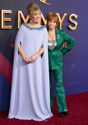 Reba McIntyre (R) and Melissa Peterman arrive for the 76th annual Primetime Emmy Awards at the Peacock Theater in Los Angeles on Sunday, September 15, 2024.  LAP202409150201 ALEXxGALLARDO