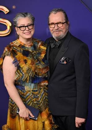 (L-R) Gisele Schmidt and Gary Oldman arrive for the 76th annual Primetime Emmy Awards at the Peacock Theater in Los Angeles on Sunday, September 15, 2024.  LAP202409150693 CHRISxCHEW