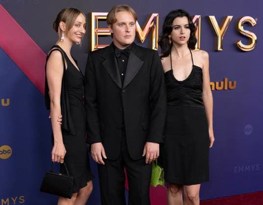 Emily Allan, John Early and Leah Hennessey arrive for the 76th annual Primetime Emmy Awards at the Peacock Theater in Los Angeles on Sunday, September 15, 2024.  LAP202409150304 ALEXxGALLARDO