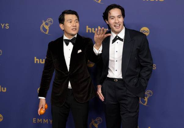 Ronny Chieng and Desmond Chiam arrive for the 76th annual Primetime Emmy Awards at the Peacock Theater in Los Angeles on Sunday, September 15, 2024.  LAP202409150319 ALEXxGALLARDO