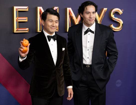 Ronny Chieng and Desmond Chiam arrive for the 76th annual Primetime Emmy Awards at the Peacock Theater in Los Angeles on Sunday, September 15, 2024.  LAP202409150320 ALEXxGALLARDO