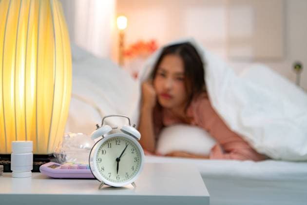 Asian young woman on the bed in the bedroom trying to wake up and prepare for work Asian young woman on the bed in the bedroom trying to wake up and prepare for work ,model released, Symbolfoto Copyright: xZoonar.com SunanxWongsa-ngax 22203945 ,model released, Symbolfoto ,property released