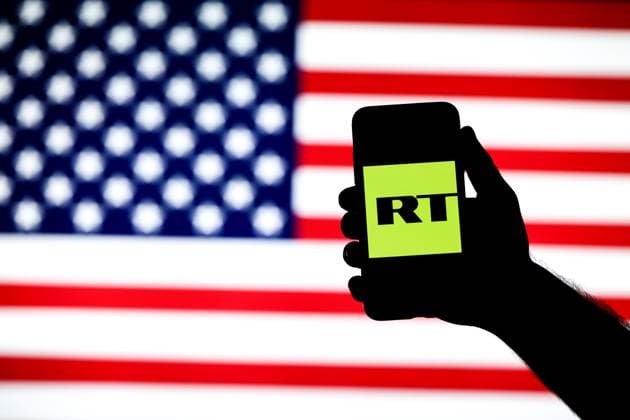 September 17, 2024, Gaziantep, Turkiye: Gaziantep, Turkiye. 17 September 2024. The RT logo on a smartphone with the American flag in the background. Meta has announced on Monday a ban on RT and the Sputnik News Agency Rossiya Segodnya from their apps globally. The social media company has justified the ban on the basis of foreign interference activityÃ¢â‚¬Â. The move follows recent US accusations against RT of trying to influence politics in Western countries, and the announcement of sanctions against the Russian state media outlet Gaziantep Turkiye - ZUMAd99_ 20240917_zap_d99_010 Copyright: xMuhammedxIbrahimxAlix