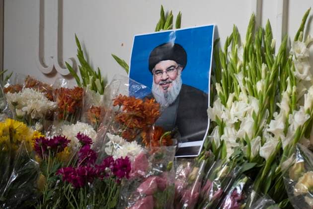 Iran: Memorial outside Lebanon s embassy A portrait of Hezbollah chief Hassan Nasrallah and flowers at the site of a memorial set up outside Lebanon s embassy in Tehran, on September 18, 2024. Exploding pagers claimed the lives of 12 people in Lebanon, including two children, the country s health minister said on September 18, updating the toll a day after the blasts blamed on Israel. Tehran Tehran Iran Copyright: SobhanxFarajvan