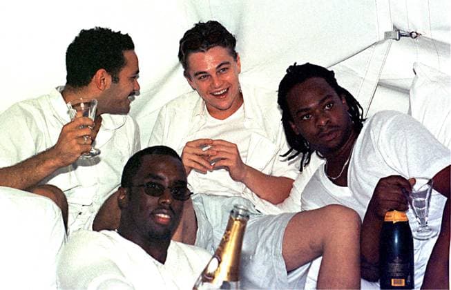 Archivbilder der Woche KW38 September 7, 1998, East Hampton, New York, USA: SEAN PUFFY P DIDDY COMBS (front center) and LEONARDO DICAPRIO .(back center) at Combs labor day party at .his house in East Hampton. In 1998, Sean Combs, aka Diddy, announced his arrival in the East Hampton by throwing a Labor Day party at his new house on Hedges Banks Drive. What the hip-hop mogul delivered was the inaugural installment of a series of summer White Parties that eventually moved to St. Tropez and Beverly Hills. East Hamptons USA - ZUMAg49_ 19980907_ent_g49_545 Copyright: xGlobexPhotosx