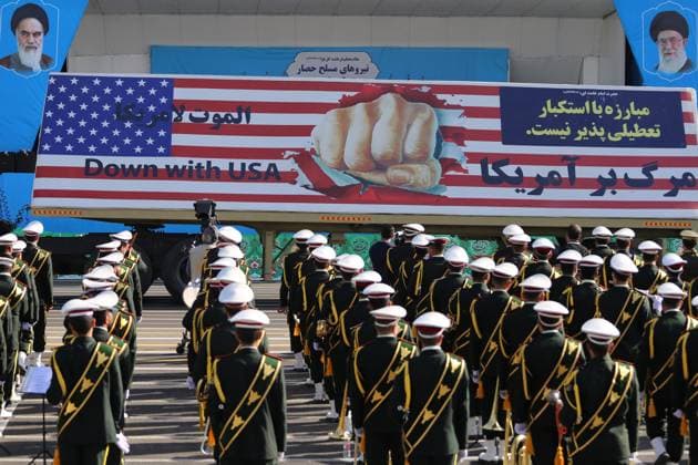 News Themen der Woche KW38 News Bilder des Tages September 21, 2024, Tehran, Iran: A giant poster written Down with USA is pictured during an annual military parade marking the anniversary of the beginning of the war against Iran by former Iraqi Dictator Hussein 44 years ago, in front of the shrine of the late revolutionary founder Ayatollah Khomeini, southern Tehran. Tehran Iran - ZUMAf146 20240921_zip_f146_051 Copyright: xRouzbehxFouladix