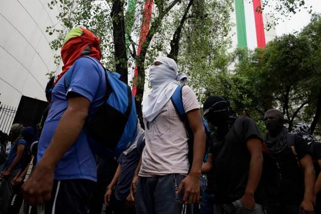 Mothers And Fathers Of The 43 Ayotzinapa Students March 10 Years After Their Disappearance The 43 missing students from Ayotzinapa throw firecrackers on Tuesday, September 24, 2024, and demonstrate outside the Senate of the Republic in Mexico City, Mexico, to demand justice and punishment for those responsible for the disappearance of their comrades almost 10 years after the events in Iguala, Guerrero state. Mexico City Mexico City Mexico  Copyright: xGerardoxVieyrax originalFilename: vieyra-notitle240924_np38f.jpg