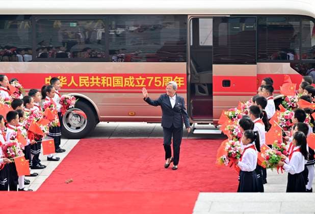 (240929) -- BEIJING, Sept. 29, 2024 -- Lu Shengmei, a recipient of the title of People s Health Worker, arrives at the Great Hall of the People in Beijing, capital of China, Sept. 29, 2024. China held a high-profile ceremony on Sunday morning to award the highest state honors ahead of the 75th founding anniversary of the People s Republic of China. ) (FOCUS)CHINA-BEIJING-HIGHEST STATE HONORS-CEREMONY (CN) LixXiang 