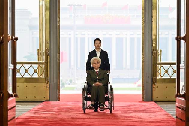 (240929) -- BEIJING, Sept. 29, 2024 -- Tian Hua, a recipient of the title of People s Artist, arrives at the Great Hall of the People in Beijing, capital of China, Sept. 29, 2024. China held a high-profile ceremony on Sunday morning to award the highest state honors ahead of the 75th founding anniversary of the People s Republic of China. ) (FOCUS)CHINA-BEIJING-HIGHEST STATE HONORS-CEREMONY (CN) YinxBogu 