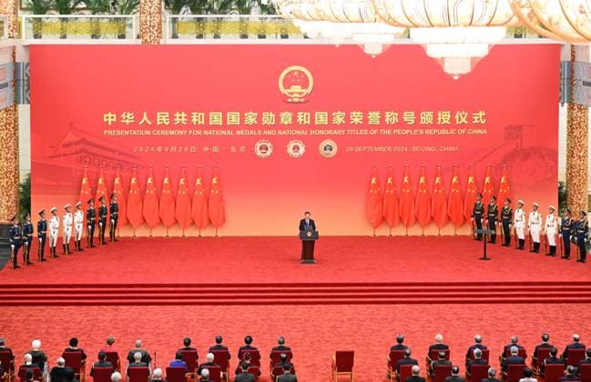 (240929) -- BEIJING, Sept. 29, 2024 -- Chinese President Xi Jinping, also general secretary of the Communist Party of China (CPC) Central Committee and chairman of the Central Military Commission, delivers a speech at a presentation ceremony for national medals and national honorary titles of the People s Republic of China at the Great Hall of the People in Beijing, capital of China, Sept. 29, 2024. Xi presented medals to recipients of national medals and honorary titles at the ceremony. ) CHINA-BEIJING-NATIONAL MEDALS AND HONORARY TITLES-PRESENTATION CEREMONY (CN) ShenxHong 