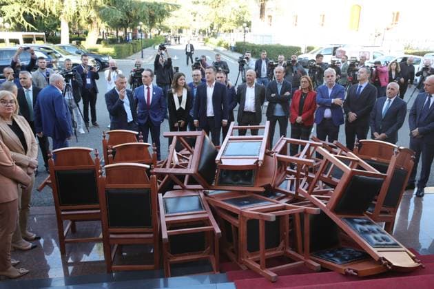 September 30, 2024, Tirana, Tirana, Albania: Members of opposition Democratic party of Albania burn chairs at the entrance of parliament as saying that Ã¢â‚¬Ëœtheir chairs belong to the citizensÃ¢ Tirana Albania - ZUMAb266 20240930_zip_b266_020 Copyright: xArmandoxBabanix
