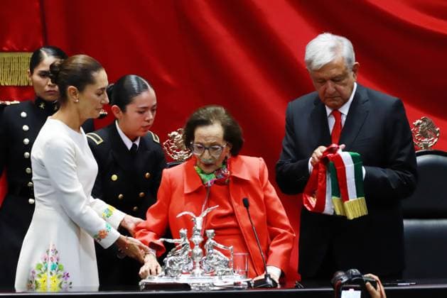 Outgoing President Andres Manuel Lopez Obrador and President of the Chamber of Deputies Ifigenia MartoÂ­nez during the symbolic act of handing over the presidential sash to Claudia Sheinbaum Pardo as the new female president of Mexico during the inauguration ceremony at the Congress of the Union. on October 1, 2024 in Mexico City, Mexico. Mexico City Mexico - ZUMAe321 20241001_zia_e321_032 Copyright: xCarlosxSantiagox