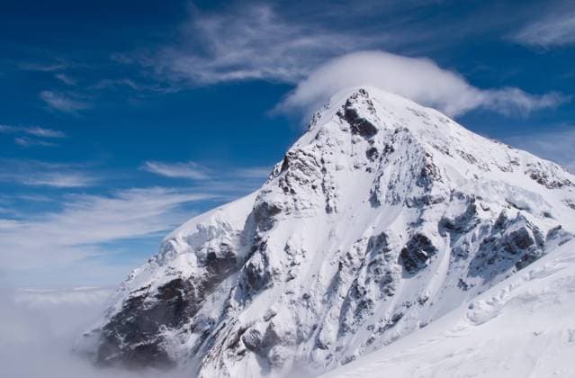 Viewpoint on Jungfraujoch Jungfraujoch in Swiss Alps showing station and distant peaks above clouds Copyright: xZoonar.com StevenxHeapx 2035513