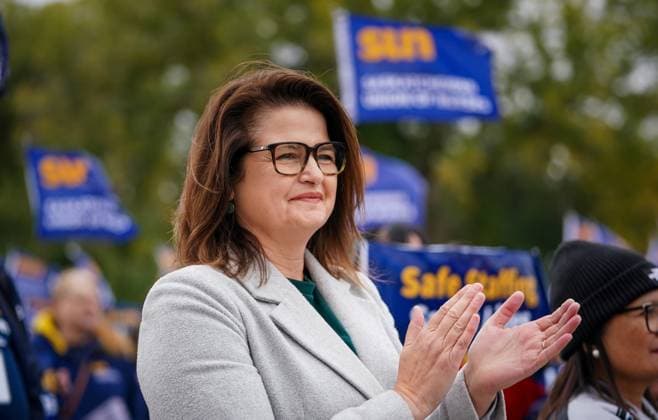 October 3, 2024, Regina, Sk, Canada: Saskatchewan NDP leader Carla Beck applauds during a rally organized by Saskatchewan Union of Nurses outside of the Saskatchewan Legislative Building in Regina, on Thursday, October 3, 2024. Regina Canada  - ZUMAc35_ 20241003_zaf_c35_097 Copyright: xHeywoodxYux