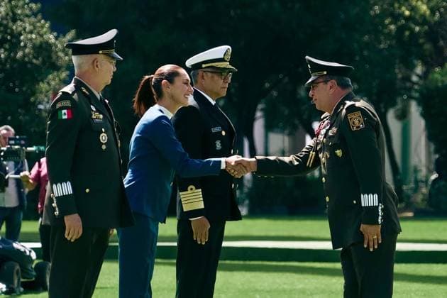 October 3, 2024, Mexico, Mexico, USA: Mexico s President Claudia Sheinbaum (C) flanked by Mexico s Defense Minister Ricardo Trevilla Trejo (L) and Secretary of the Navy Raymundo Pedro Morales Angeles (R) during the military inauguration ceremony of Claudia Sheinbaum as Supreme Commander-in-Chief of the Mexican Armed Forces, at the Campo Marte Military Camp, in Mexico City, Mexico on October 03, 2024. PRESIDENCIA POOL PI Mexico USA - ZUMAp124 20241003_zaa_p124_056 Copyright: xPresidenciax