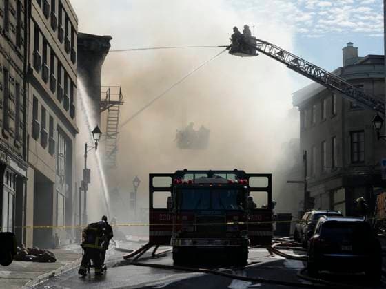 October 4, 2024, Montreal, Pq, CANADA: Firefighters battle a fire in Old Montreal on Friday, Oct.4, 2024. Montreal police are investigating a major fire that broke out early this morning in a century-old building in Old Montreal, leaving at least one person in hospital. Montreal CANADA  - ZUMAc35_ 20241004_zaf_c35_027 Copyright: xRyanxRemiorzx