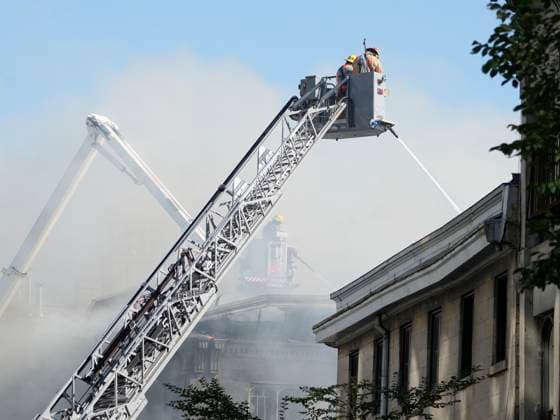 October 4, 2024, Montreal, Pq, CANADA: Firefighters battle a fire in Old Montreal on Friday, Oct.4, 2024. Montreal police are investigating a major fire that broke out early this morning in a century-old building in Old Montreal, leaving at least one person in hospital. Montreal CANADA  - ZUMAc35_ 20241004_zaf_c35_032 Copyright: xRyanxRemiorzx