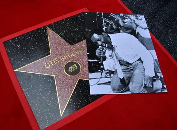 A photo of singer songwriter Otis Redding lies on his star during a posthumous unveiling ceremony honoring the late entertainer with the 2,791st star on the Hollywood Walk of Fame on Friday, October 4, 2024.  LAP2024100405 JIMxRUYMEN