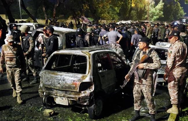 News Themen der Woche KW41 (241007) -- KARACHI, Oct. 7, 2024 -- This photo taken on Oct. 7, 2024 shows destroyed cars at the site of a terrorist attack near Jinnah International Airport in Karachi, the capital city of Pakistan s south Sindh province. Two Chinese nationals were killed, one Chinese national injured, and several Pakistani nationals were killed and injured in a terrorist attack in Pakistan s southern port city of Karachi on Sunday night, the Chinese embassy in Pakistan confirmed. (Str Xinhua) PAKISTAN-KARACHI-TERRORIST ATTACK AixHamaide¡¤kamaile 