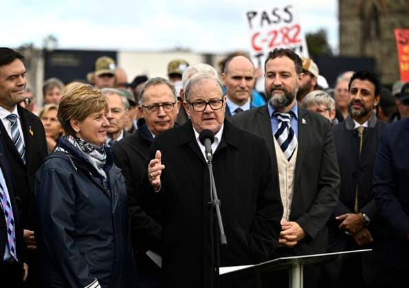 October 10, 2024, Ottawa, On, CAN: Minister of Agriculture and Agri-Food Lawrence MacAulay, centre, speaks at a news conference on the lawn of Parliament Hill in Ottawa, on Thursday, Oct. 10, 2024. Members of Parliament from the Bloc Quebecois, Liberal, NDP and Green Parties, federal cabinet ministers and agriculture producers participated in the event to urge the Senate to pass Bill C-282 on supply management. Ottawa CAN - ZUMAc35_ 20241010_zaf_c35_052 Copyright: xJustinxTangx