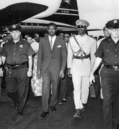 Orig. caption... PREMIER OF THE REPUBLIC OF THE CONGO ARRIVES IN NEW YORK Premier Patrice Lumumba (2nd from left), of the Republic of the Congo, photographed with an aide, Capt. Mawoso (2nd from r.), as he arrived at New York s International Airport (Idlewild) this morning. The Premier, who was accompanied on the trip by Mr. Kasongo, President of The House of Representatives, and Mr. Okito, Vice-President of the Senate, stated that the purpose of this trip is to establish direct contact with the U.N. Secretary-General in order to find a speedy solution to the problems facing the Republic of the Congo. Note Independent Republic 1960, formerly Belgian Congo P Lumumba - Congolese politician, 1925-1961. After independence in 1960, he was appoin  Copyright: xXxXxXx LUMUMBA IN THE USA