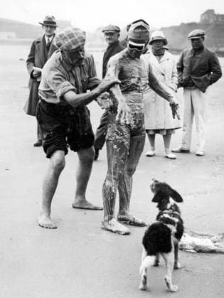 Orig. caption... GERTRUDE EDERLE SWIMS THE ENGLISH CHANNEL. Miss Gertrude Ederly today, Aug.6, swam the English Channel in the record tome of 14 1 2 hours. She is the first woman ever to have gotten across. Photo shows: Miss Ederle being greased down by her trainer just before entering the water on her attempt to swim the Channel. Note Channel Swimming Swimming Swimwear Fat English Channel Swimming Sport Records Coach The first woman to swim across the English Channel See also BAO974 CD139 persons: Gertrude Ederle sites: FRANCE ;USA* sp_sw x5600x *** Orig caption GERTRUDE EDERLE SWIMS THE ENGLISH CHANNEL Miss Gertrude Ederly today, Aug 6, swam the English Channel in the record tome of 14 1 2 hours She is the first woman ever to have gotte  Copyright: xXxXxXx EDERLE, GERTRUDE