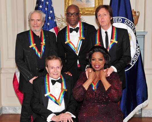 2010 Kennedy Center Honors Gala Dinner - Class Photo The 2010 Kennedy Center honorees pose for their formal class photo following the formal Artist s Dinner at the United States Department of State in Washington, D.C. on Saturday, December 4, 2010. Top row, from left to right: Merle Haggard, Bill T. Jones, and Sir Paul McCartney. Bottom row, from left to right: Jerry Herman and Oprah Winfrey. Photo Credit: Ron Sachs CNP AdMedia Washington District of Columbia United States of America EDITORIAL USE ONLY  Copyright: xx D3B_0140 RonxSachsx admphotos725566